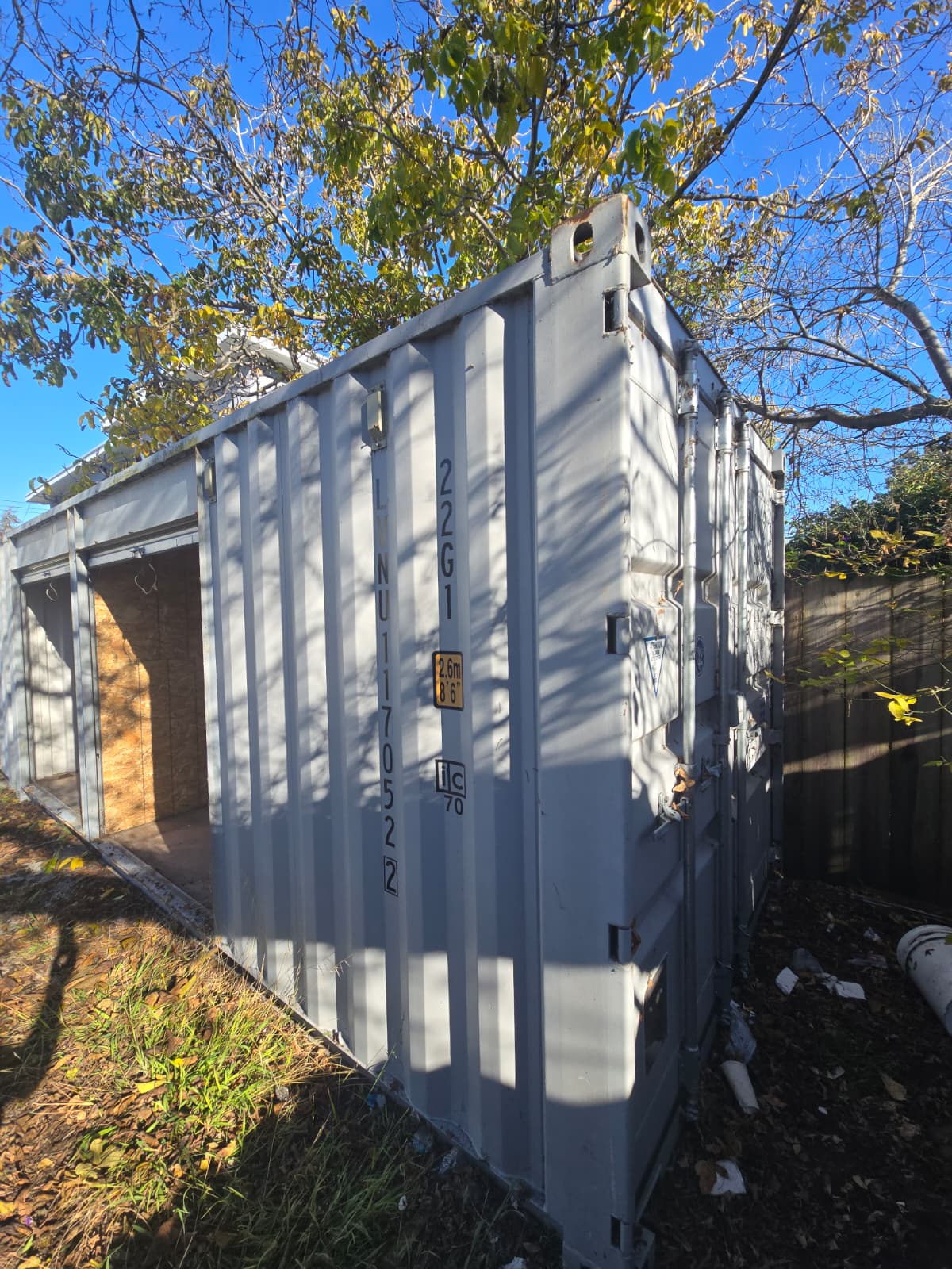 20' Custom Storage Container – 8 Years Old – Dual Partitions + Dual 6' Roll-Up Doors